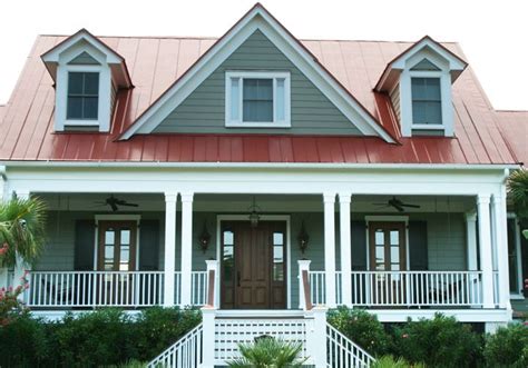 red metal roof grey house|red and grey house.